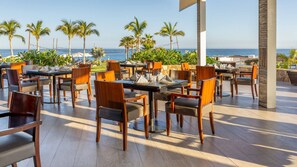 Outdoor dining - Escape to a beautiful two-bedroom oceanfront resort in Cabo. (San José del Cabo)