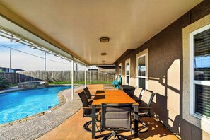 Outdoor dining - Private Pool + Spa + Fenced Backyard • Near North Padre Island | Graceland (Corpus Christi)