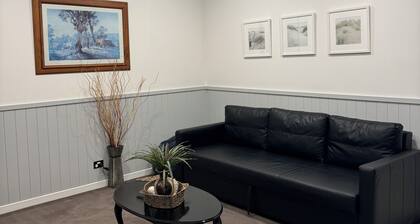 Private Waterfront Retreat w Boat Ramp.
Beach around the Corner.