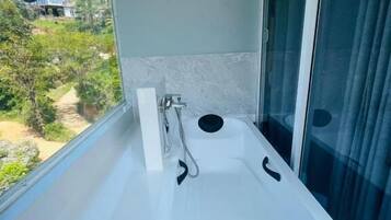 Suite Deluxe, balcone, vista montagna | Bagno