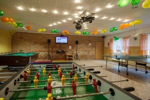 A room with a foosball table, a pool table, and a ping pong table. - Four -anniversary Type B (Dzwirzyno)