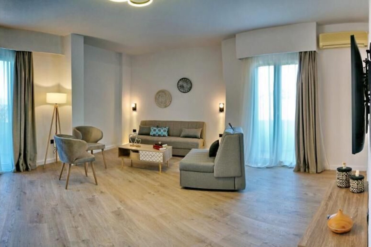 Suite Deluks, balkon, pemandangan pantai | Area keluarga