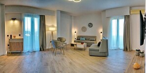 Suite Deluks, balkon, pemandangan pantai | Area keluarga