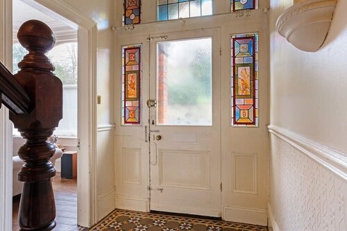 Spacious, centrally located, Victorian former vicarage townhouse with park views