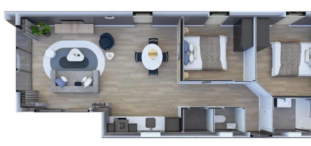 Distribución de una habitación de hotel con sala de estar, una mesa de comedor, dos dormitorios, un baño y una kitchenette.