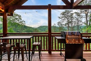 Outdoor dining - Laughing Fox Lodge | 8BR Indoor Pool Cabin with Putt Putt (Sevierville)