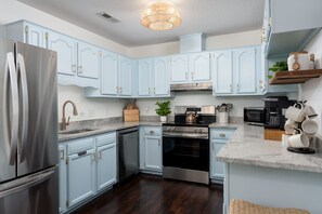 Coffee/tea maker, fridge, microwave, oven