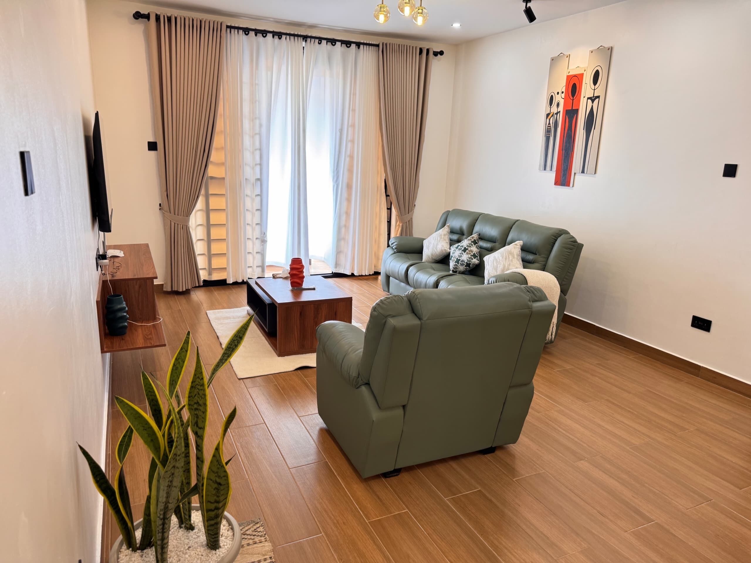 Apartamento conforto, vista para a cidade | Área de estar