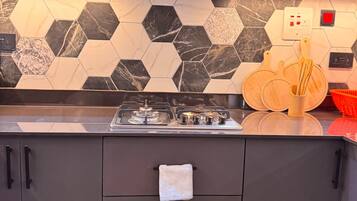 Apartamento conforto, vista para a cidade | Cozinha privada