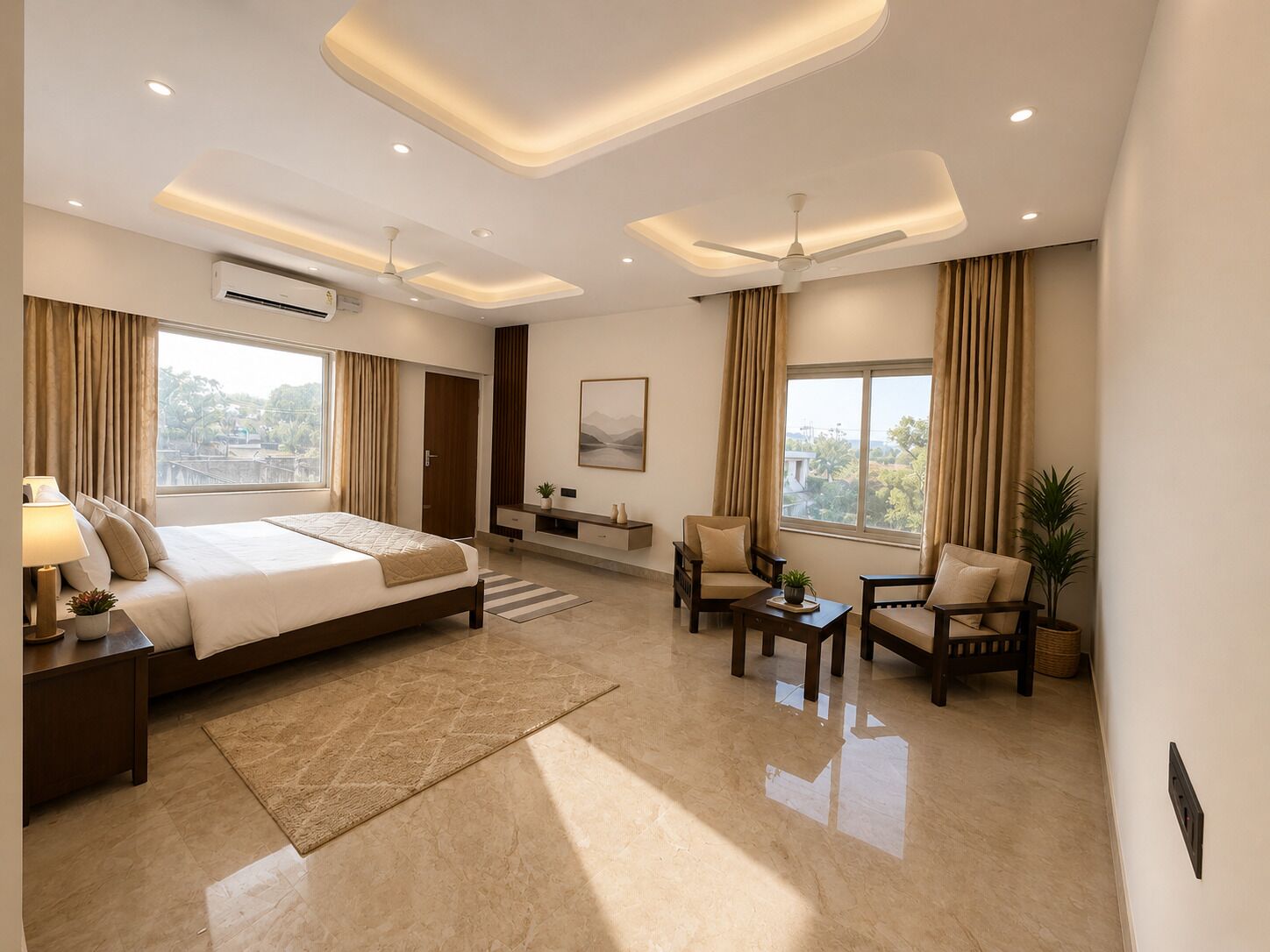 A modern hotel room with a large bed, a seating area with a coffee table, and a view of the outdoors.