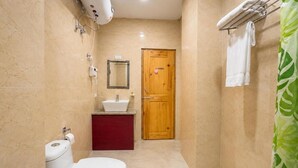 Deluxe Double or Twin Room, Balcony, Mountain View | Bathroom | Slippers - Hotel Pema Kara (Paro)