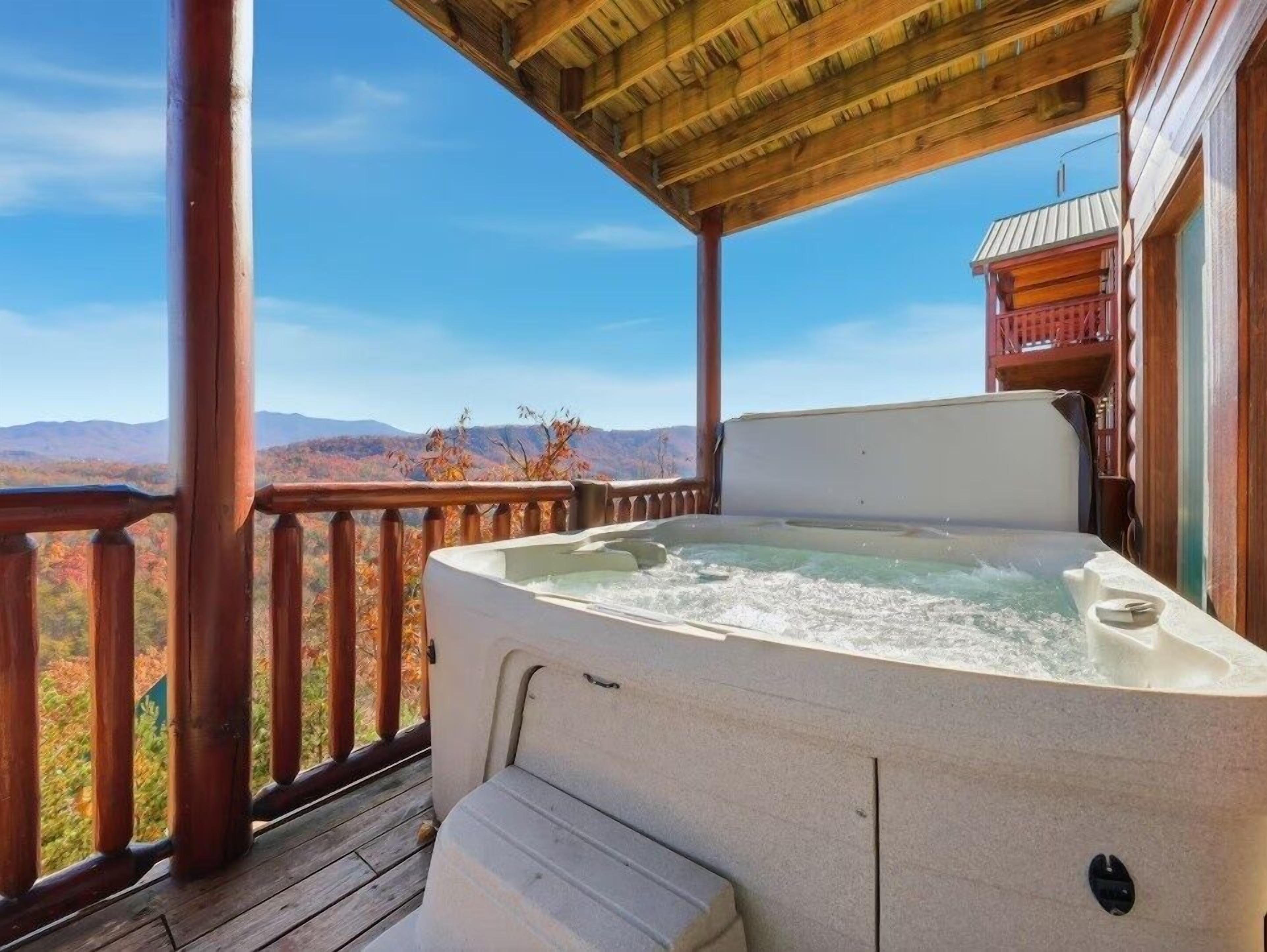 Cabin, 5 Bedrooms | Outdoor spa tub