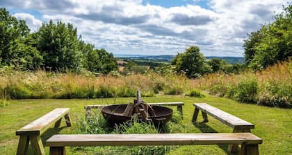 16th-century Farmhouse near Sidmouth with lovely rooms and sea view.
