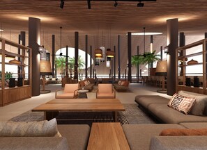 Eine geräumige Lobby mit hohen Decken, modernen Möbeln und großen Fenstern mit Blick auf Palmen.