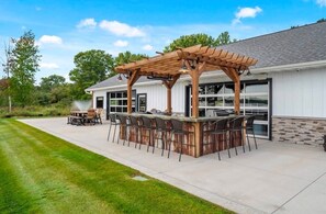 Outdoor dining - Spacious Lakefront Retreat, with Room for Everyone. Cabin and Event Center. (Isanti)