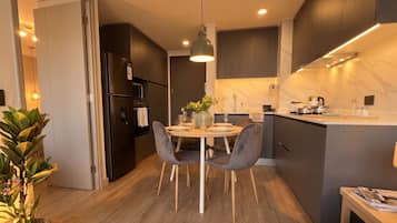 Apartment, 1 Bedroom | Private kitchen | Fridge, microwave, oven, cookware/dishes/utensils