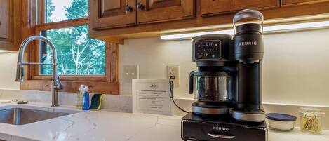 Coffee/tea maker, fridge, microwave, oven