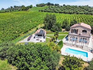 A large estate with a swimming pool, a stone building, and a vineyard. - Tenuta Marino – con piscina privata by Interhome (Cesano)