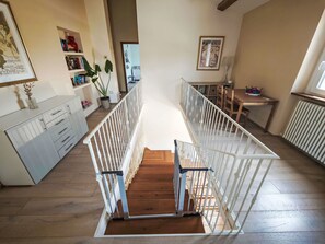 A staircase with white railings leading to an upper floor. - Tenuta Marino – con piscina privata by Interhome (Cesano)