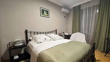 Family Quadruple Room, Balcony, City View | Desk, free WiFi