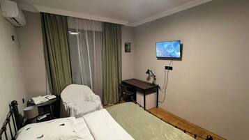 Family Quadruple Room, Balcony, City View | Desk, free WiFi