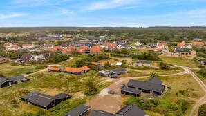 An aerial view of a residential area with houses, roads, and green spaces. - "Arsi" - 350m from the sea by Interhome (Thisted)