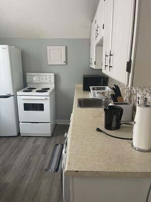 Private kitchen - A cute apartment located in downtown St. Thomas. Family friendly environment. (St. Thomas)