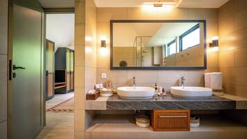Deluxe Villa, Multiple Beds, Patio, Lake View | Bathroom | Shower, hair dryer, towels, soap