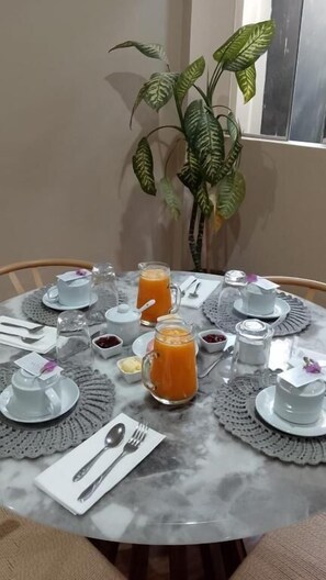 Suite Deluxe, patio | Restaurantes