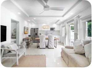 Living area - Boutique 3 bedroom apartment near Mullins beach. Tropical gardens  swimming pool (Mullins)