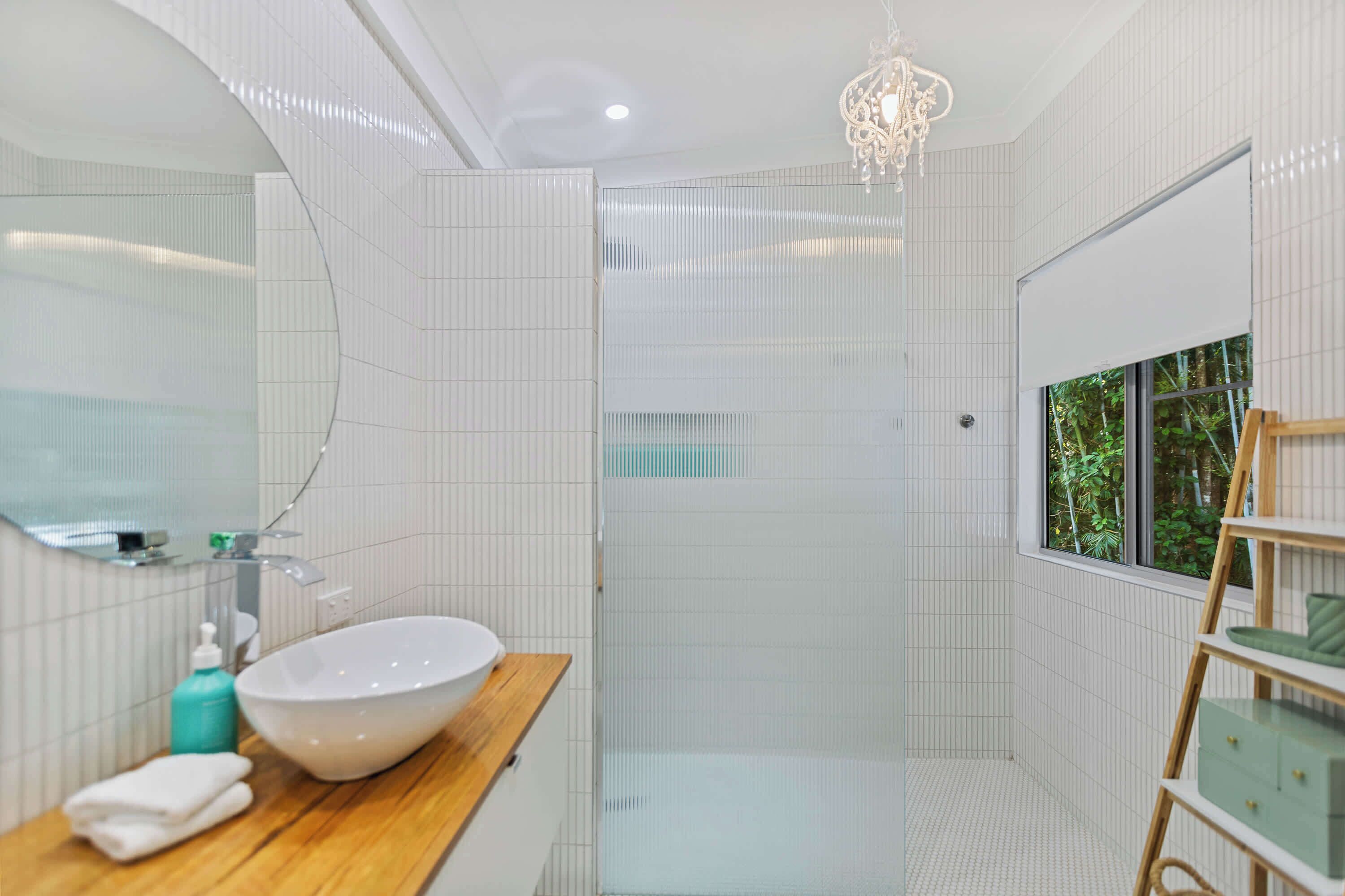 Shower, hair dryer, towels, shampoo