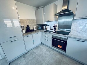 Dormitorio compartido, 1 habitación, para fumadores | Cocina privada