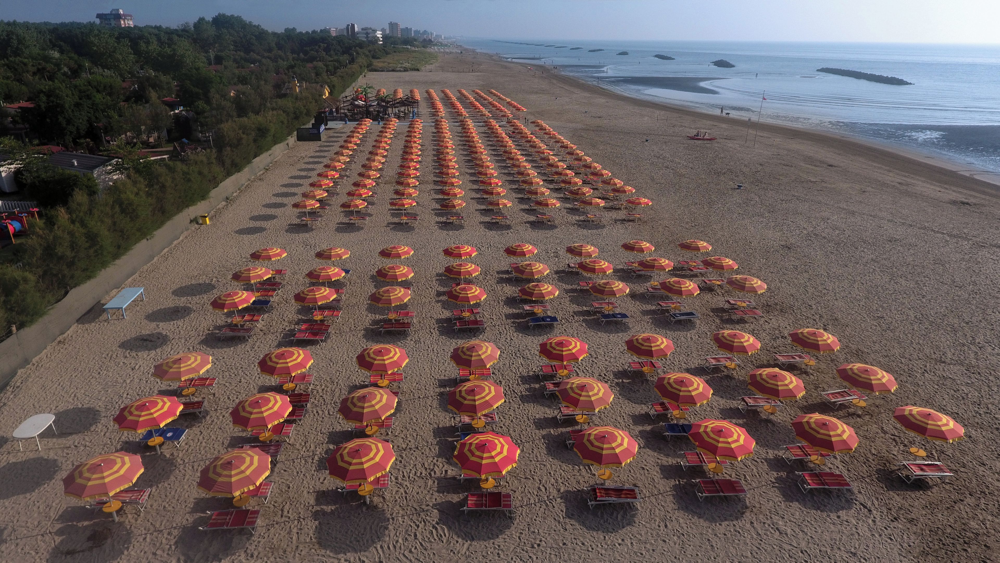 Private beach, white sand, beach umbrellas, beach volleyball