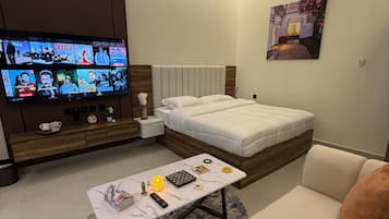 Studio Suite | Living area | 75-cm Smart TV with digital channels