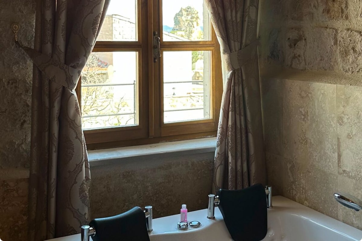 Premium bedding, desk, laptop workspace, free WiFi