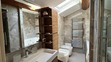 Luxury Suite, Balcony, River View | Bathroom | Free toiletries, hair dryer, slippers, towels