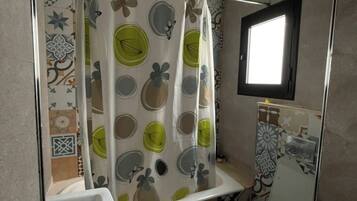 Hair dryer, bidet, towels, toilet paper