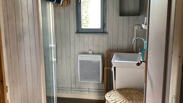 Shower, towels, soap, toilet paper