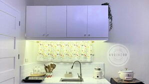 Fridge, cookware/dishes/utensils, dining tables