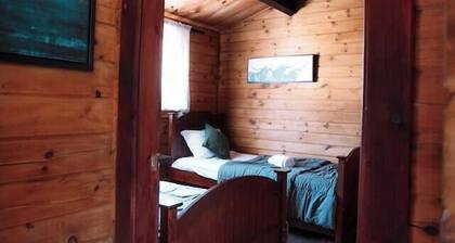 Beautiful River-front Log Cottage: Glass Room, Hot Tub & Sauna