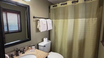 Hair dryer, towels, shampoo