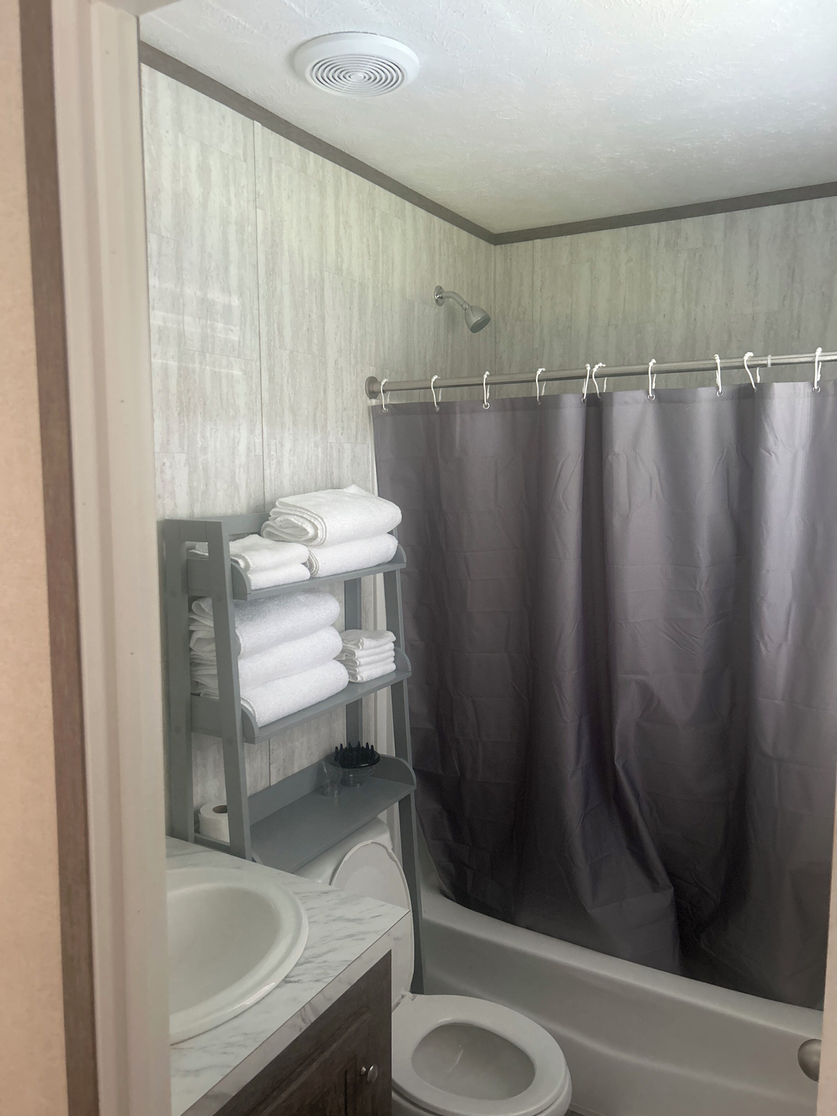 Hair dryer, towels, soap, toilet paper
