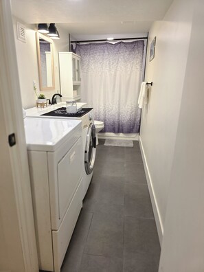 Shower, hair dryer, towels, soap - Vrbo Property (Sandy)