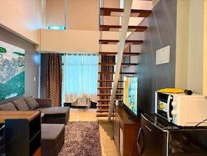 Loft familiar, vistas a la ciudad | Zona de estar