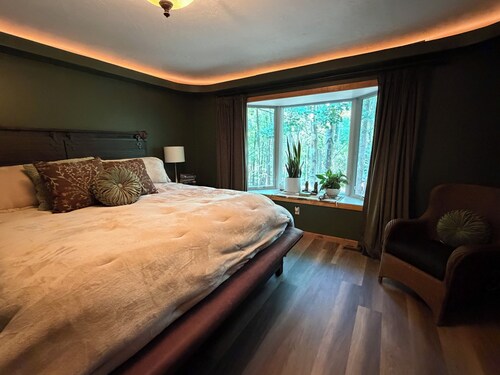 Pure relaxation awaits at this secluded Rustic Cabin nestled in the forest