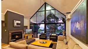 TV, fireplace, offices - Whitehaven—Stylish Group Retreat with Ocean Views (Eagle Bay)