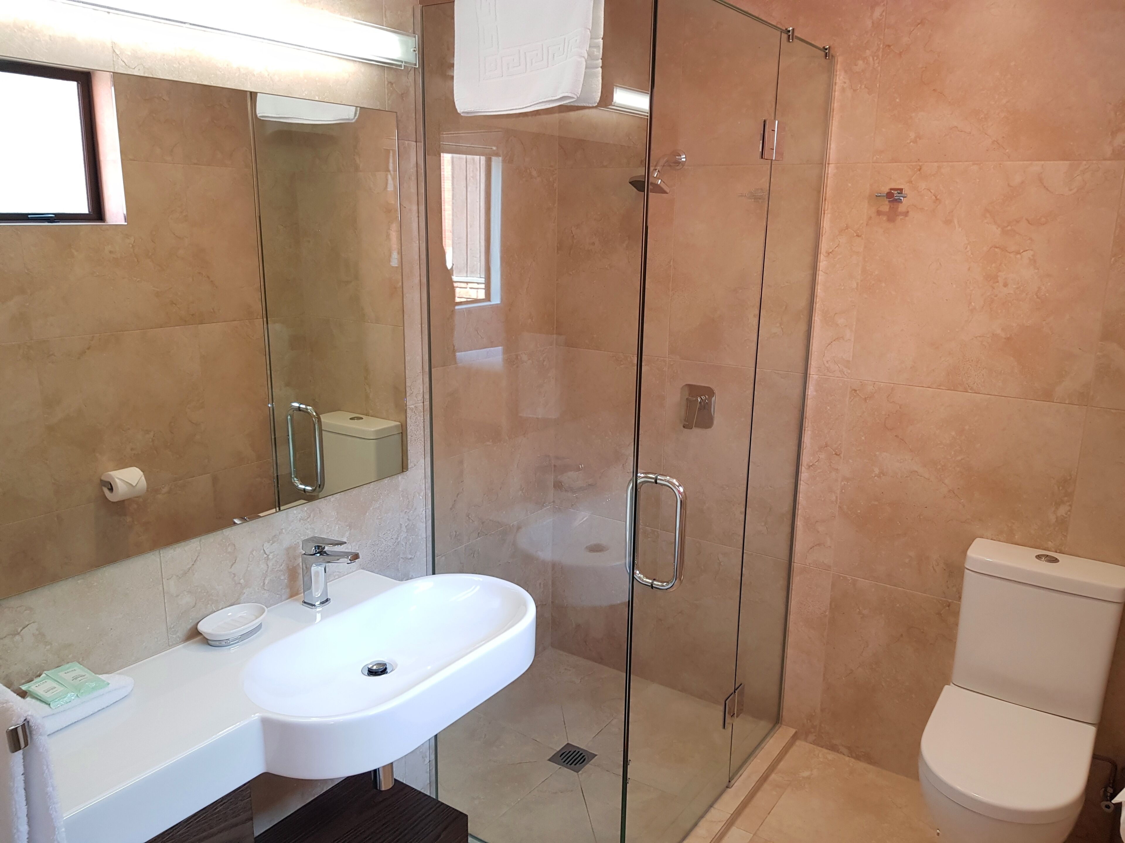 Executive Townhome, 2 Bedrooms, Courtyard View | Bathroom | Shower, hair dryer, towels, soap
