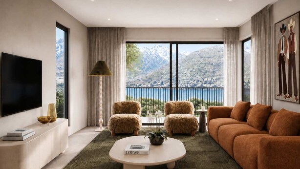 A modern living room with a large flat-screen TV, a sofa, a coffee table, and a view of mountains through large windows. - Lakehouse 62 – Brand New Lakefront Villa with Spa (Queenstown)