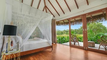 Suite Deluxe, balcón, vistas al jardín | Caja fuerte