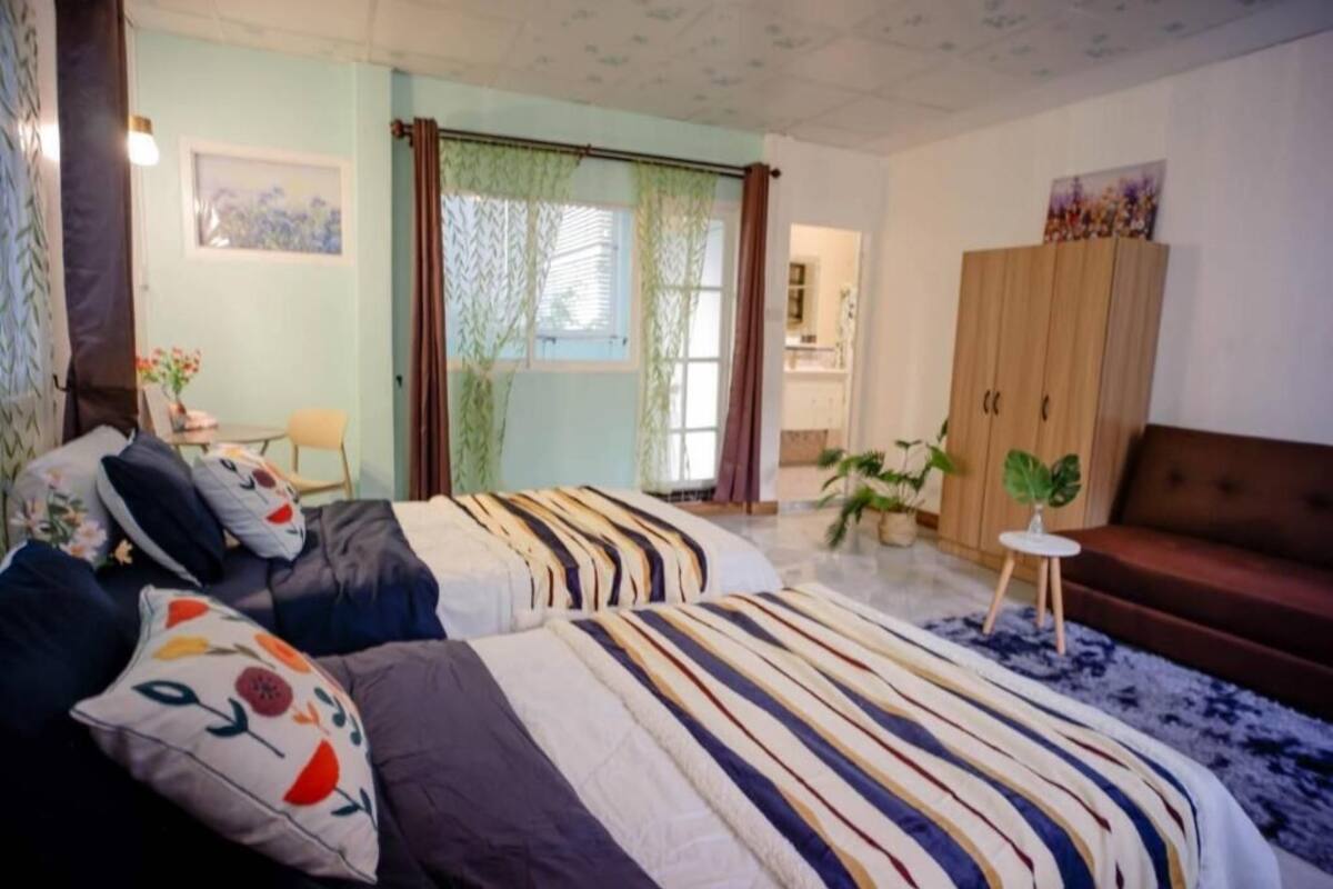 Chambre Deluxe avec lits jumeaux, balcon, vue jardin | Wi-Fi gratuit